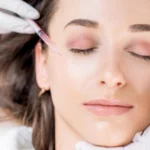 Woman receiving a Botox injection near the eye area in Dallas, GA
