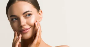 Woman showing smooth, youthful skin after Juvederm® treatment in Dallas, GA
